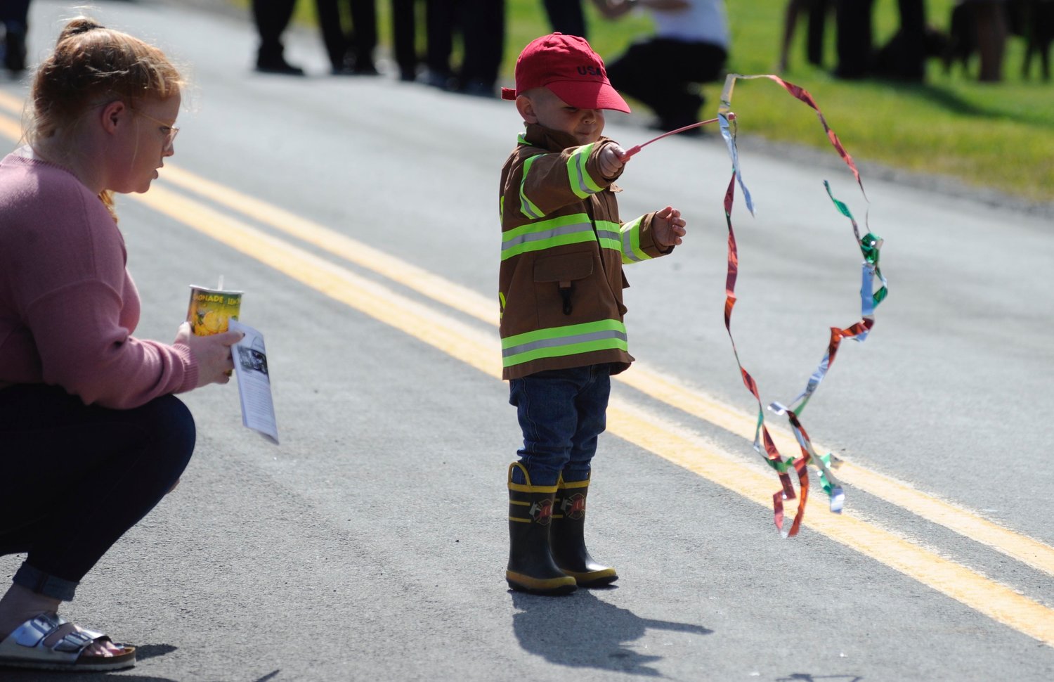 The littlest firefighter. After the parade, it was time to bring out the steamers.